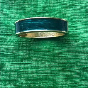 Gold tone bangle type bracelet
